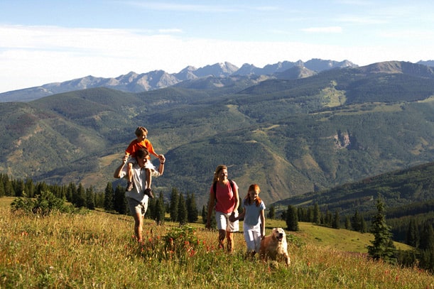 Family-hiking-with-dog-on-Vail-Mountain